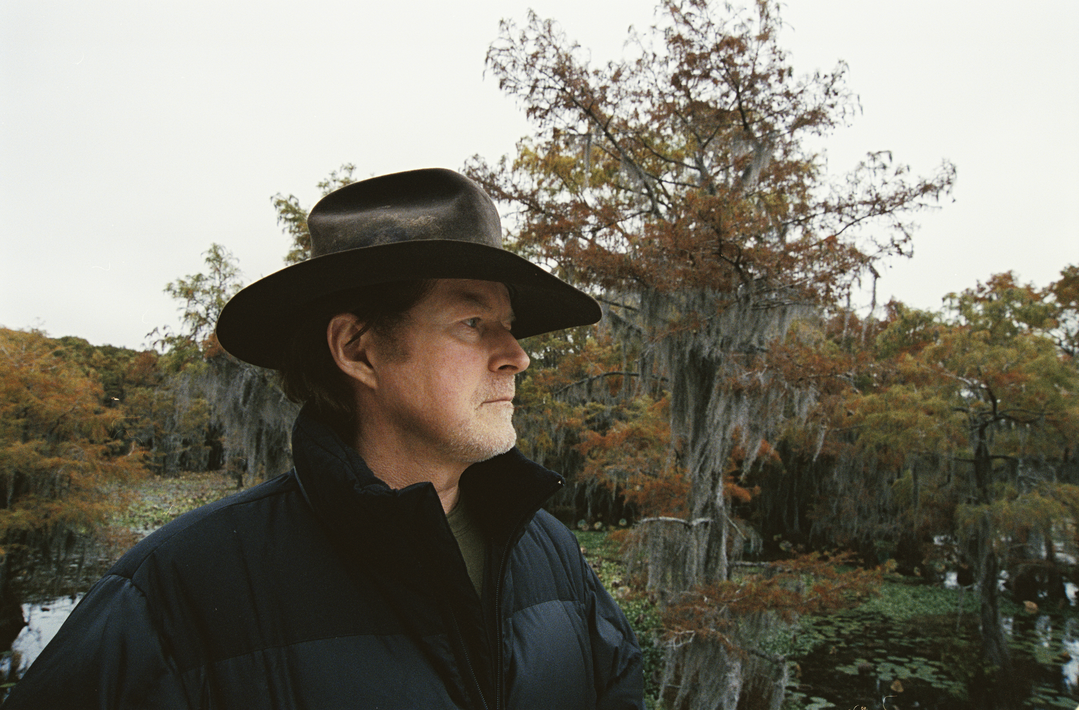Man standing in front of a tree
