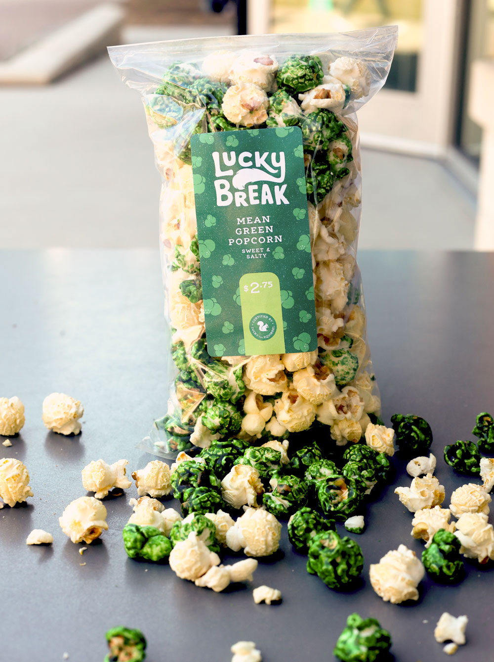 Bag of green and white popcorn