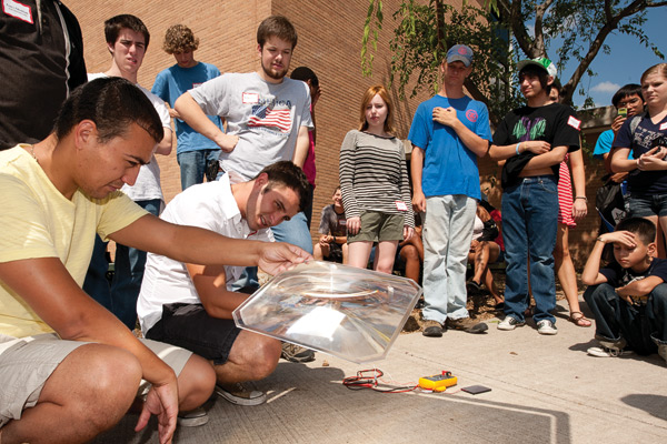 High school students at the ASM Materials Camp hosted by the Department of Materials Science and Engineering harnessed the power of the Texas sun, gaining hands-on experience with the tools researchers use to create the materials of tomorrow. (Photo by Jonathan Reynolds)