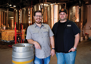 Bobby Mullins ('07) and Yianni Arestis ('08, '11 M.B.A.) (Photo by Gary Payne)