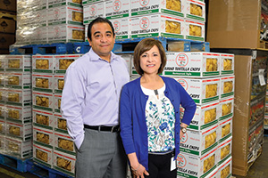 Rudy's Tortillas - Siblings Kathy Purser ('81) and Joe Guerra ('96) help run third-generation family tortilla company in Carrollton. (Photo by Michael Clements)