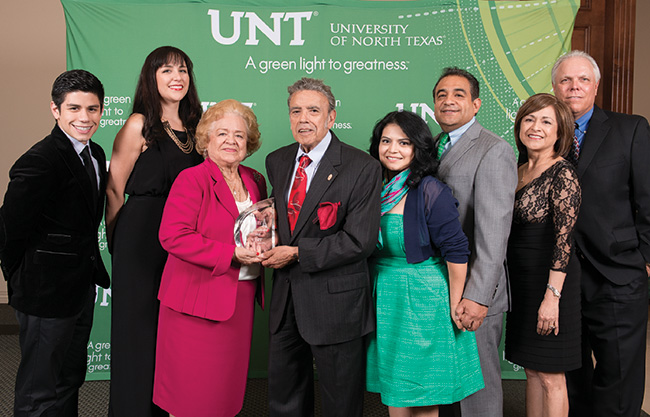 From left, Michael Masters, Rachel Purser ('09), Carmen Guerra, Rudy Guerra Sr., Pauline Guerra ('05), Joe Guerra ('96), Kathy Guerra Purser ('81), Forrest Purser. (Photo by Gary Payne)