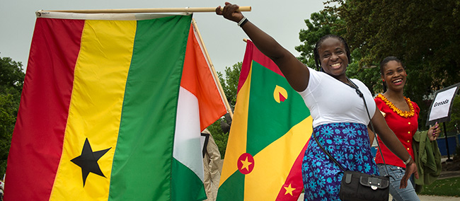 Students from different organizations on campus joined the annual Flag Parade as part of University Day celebrations this spring. (Photo by Ahna Hubnik)