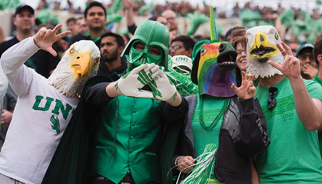 Following the morning's Homecoming parade and tailgating Nov. 5, UNT fans and students cheered on the Mean Green football team at Apogee Stadium. (Photo by Gary Payne)