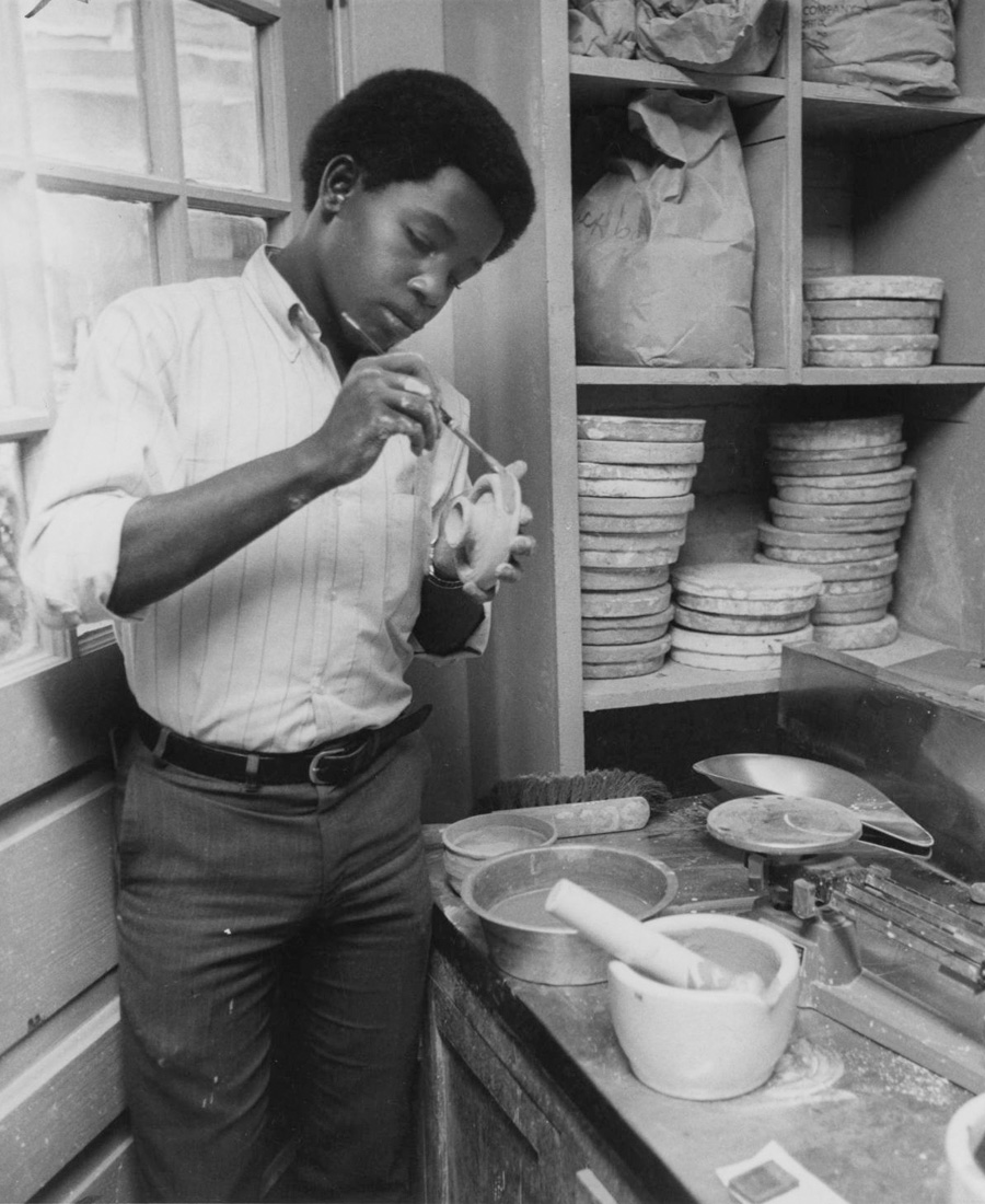 Student working with ceramics