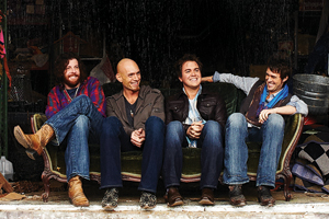 ACM-winning Eli Young Band members, from left, James Young (’02), Chris Thompson (’04), Mike Eli (’04) and Jon Jones (’04), formed their country quartet  as UNT students. (Photo by Jeremy Cowart)