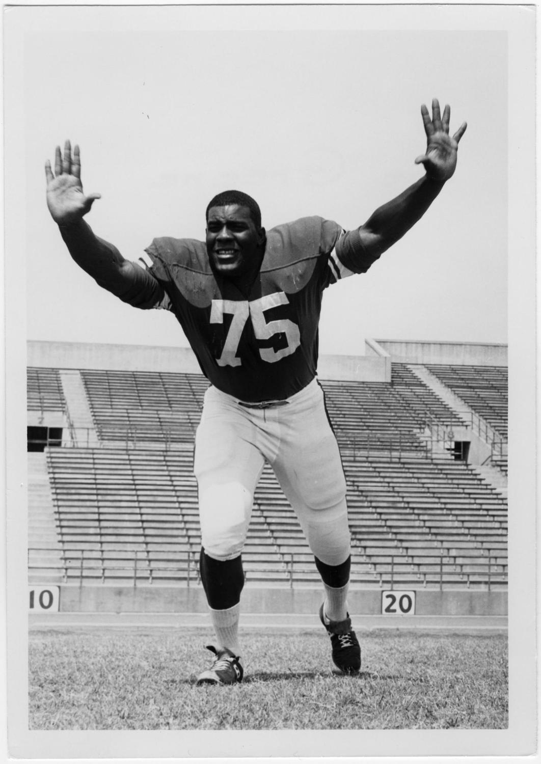 Joe Greene, when he was a member of the Mean Green football team. This photo was the inspiration for his statue at Apogee Stadium's Gate 2.